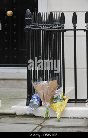 Belgravia, London, UK. 9th April 2013. Three bouquets of flowers left in tribute to Margaret Thatcher. Flowers left at the home of the late Baroness Thatcher. Credit: Matthew Chattle / Alamy Live News Stock Photo