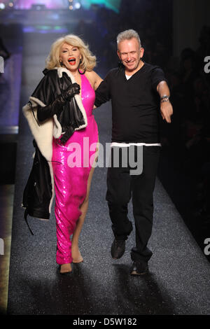 French singer, lyricist, composer, painter, TV presenter, actress and novelist Amanda Lear, special guest of Jean Paul Gaultier's fashion, show wearing a creation by Jean Paul Gaultier appears on stage together with Jean Paul Gaultier during 'Paris fashion week ready to wear' Spring/Summer 2013 in Paris, France, 29 September 2012. The fashion week runs from 25 September to 03 Octob Stock Photo