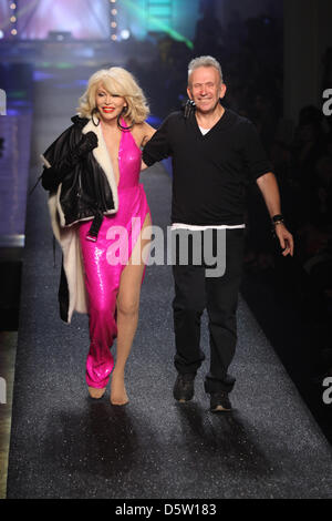 French singer, lyricist, composer, painter, TV presenter, actress and novelist Amanda Lear, special guest of Jean Paul Gaultier's fashion, show wearing a creation by Jean Paul Gaultier appears on stage together with Jean Paul Gaultier during 'Paris fashion week ready to wear' Spring/Summer 2013 in Paris, France, 29 September 2012. The fashion week runs from 25 September to 03 Octob Stock Photo