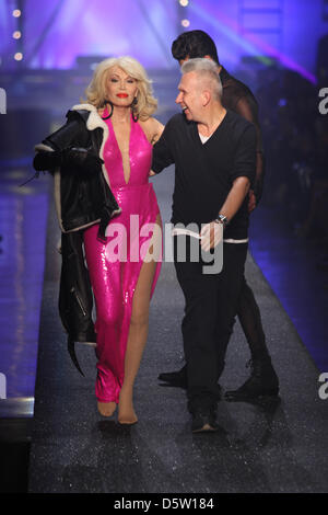 French singer, lyricist, composer, painter, TV presenter, actress and novelist Amanda Lear, special guest of Jean Paul Gaultier's fashion, show wearing a creation by Jean Paul Gaultier appears on stage together with Jean Paul Gaultier during 'Paris fashion week ready to wear' Spring/Summer 2013 in Paris, France, 29 September 2012. The fashion week runs from 25 September to 03 Octob Stock Photo