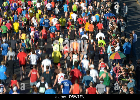 A field of runners is pictured after the start of the 39th Berlin Marathon on Strasse des 17. Juni in Berlin, Germany, 30 September 2012. About 41 000 participants have registered for the 42,195 track that leads them across the German capital. Photo: Rainer Jensen Stock Photo