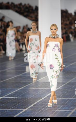 Models present creations by German designer Karl Lagerfeld for Chanel ...