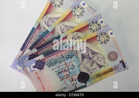 The portrait of the old dictator Gaddafi adorns a few banknotes like the 1 dinar bill in Tripoli, Libya, 02 September 2012. One point that will occupy the new government is how long these notes will continue to be in circulation. Photo: Matthias Toedt Stock Photo