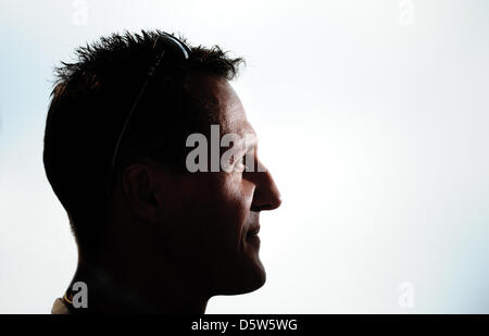 (dpa-file) - A file picture dated 29 July 2010 shows German Formula One pilot Michael Schumacher of Nercedes GP during a press conference in Budapest, Hungary. 43-year-old Schumacher announced on 04 October 2012 in Suzuka, that he will end his career after the current season. Photo: Peter Steffen Stock Photo