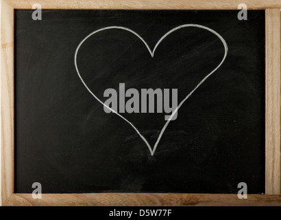 A blackboard with a hand drawn heart Stock Photo