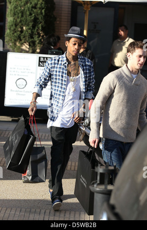 Rapper Wiz Khalifa shopping at Barney's New York in Beverly Hills on Valentine's Day Los Angeles, California - 14.02.12 Stock Photo