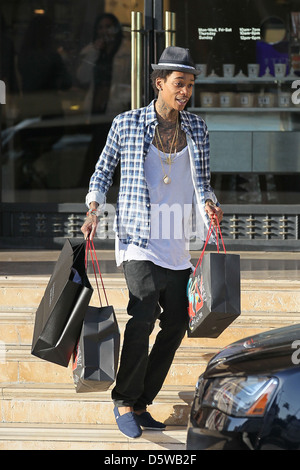 Rapper Wiz Khalifa shopping at Barney's New York in Beverly Hills on Valentine's Day Los Angeles, California - 14.02.12 Stock Photo