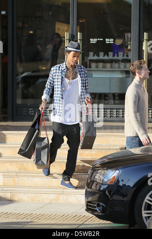 Rapper Wiz Khalifa shopping at Barney's New York in Beverly Hills on Valentine's Day Los Angeles, California - 14.02.12 Stock Photo