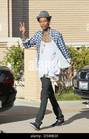 Rapper Wiz Khalifa shopping at Barney's New York in Beverly Hills on Valentine's Day Los Angeles, California - 14.02.12 Stock Photo