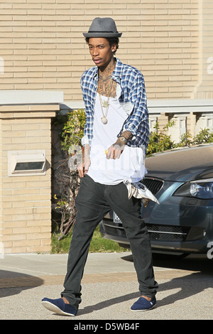 Rapper Wiz Khalifa shopping at Barney's New York in Beverly Hills on Valentine's Day Los Angeles, California - 14.02.12 Stock Photo