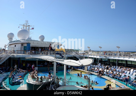 Pool deck and pool bar on Royal Caribbeans Brilliance of the Seas cruise ship. Stock Photo