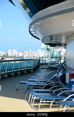 Side view of cruise ship deck and lounge chairs in San Juan. Stock Photo