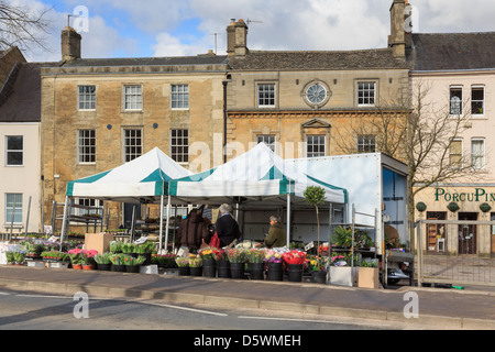 Market stall selling flowers in the High Street, Chipping Norton, Oxfordshire, England, UK, Britain Stock Photo