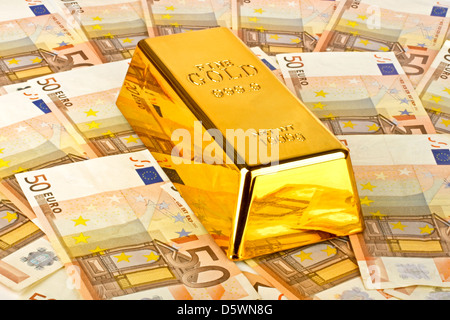 Gold bar and euro money Stock Photo