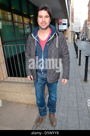 Normally dapper TV presenter Craig Doyle spotted at Today FM studios in a hoodie and jeans with wife Dublin, Ireland - Stock Photo