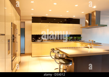 Counters and lighting in modern kitchen Stock Photo