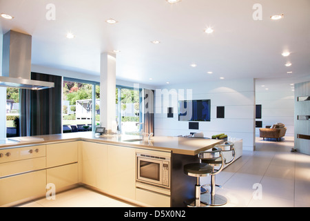 Kitchen and living room in modern home Stock Photo