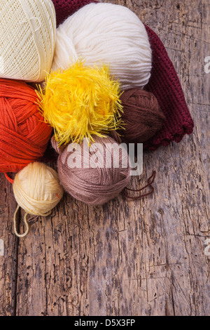 Crochet. Threads on a wooden surface Stock Photo