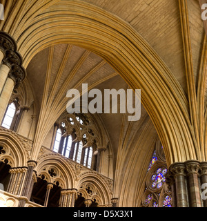 Pointed Gothic masonry arches, stone pillars and vaulted ceilings, Lincoln Cathedral, Lincolnshire, England, UK Stock Photo