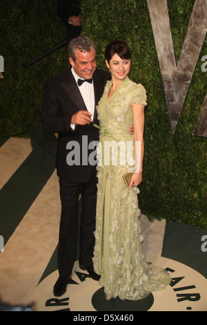 Olga Kurylenko, Danny Huston 2012 Vanity Fair Oscar Party at Sunset Tower Hotel - Arrivals Los Angeles, California - 26.02.12 Stock Photo