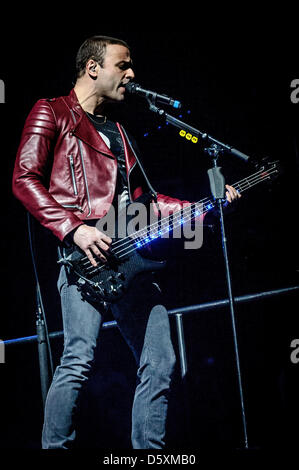 Toronto, Ontario, Canada. 9th April 2013. Bassist of English rock band Muse, CHRISTOPHER WOLSTENHOLME on stage of Air Canada Centre in Toronto (Credit Image: Credit:  Igor Vidyashev/ZUMAPRESS.com/Alamy Live News) Stock Photo