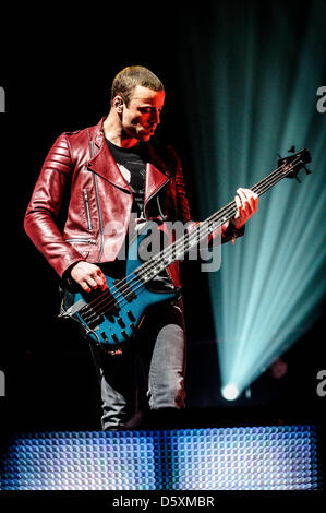 Toronto, Ontario, Canada. 9th April 2013. Bassist of English rock band Muse, CHRISTOPHER WOLSTENHOLME on stage of Air Canada Centre in Toronto (Credit Image: Credit:  Igor Vidyashev/ZUMAPRESS.com/Alamy Live News) Stock Photo