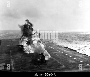 A Douglas AD-4 'Skyraider' of attack squadron VA-115 'Arabs', Carrier Air Group 11 (CVG-11), bursts into flame as the engine breaks off upon landing aboard the USS PHILIPPINE SEA (CV-47) on December 12, 1950. Stock Photo