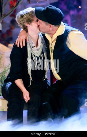 Musician Michael Hirte and his girlfriend Jenny Grebe are pictured during the 'Autumn Festival of Surprises' held in Riese, Germany, 13 October 2012. Silbereisen proposed to his girlsfriend during the event. Photo: ANDREAS LANDER Stock Photo