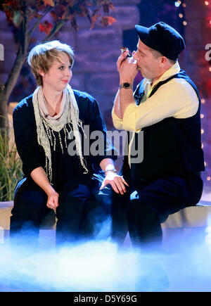 Musician Michael Hirte and his girlfriend Jenny Grebe are pictured during the 'Autumn Festival of Surprises' held in Riese, Germany, 13 October 2012. Silbereisen proposed to his girlsfriend during the event. Photo: ANDREAS LANDER Stock Photo