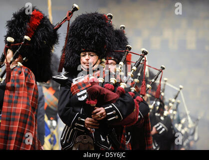 120 Scottish bagpip players perform during the 'Music Show Scotland' in Saarbruecken, Germany 13 October 2012. Photo: Becker&Bredel Stock Photo