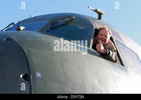 Airplane collector Clemens Aulich sits in the cockpit of a Transall C-160 military aircraft at the airfield in Ballenstedt, Germany, 16 October 2012. The transport aircraft will be exhibited at the airfield for two years before it will be taken to the aviation museum in Wernigerode. Photo: MATTHIAS BEIN Stock Photo