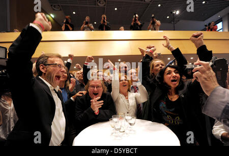 Supporters of the candidate for mayor of Stuttgart of the Green Party, Fritz Kuhn, celebrate after the announcement of the result of a new projection of the results of the election at the city hall in Stuttgart, Germany, 21 October 2012. After 215 of 433 constituencies have been counted, Kuhn leads with 51.3 percent of the vote. Photo: Franziska Kraufmann Stock Photo