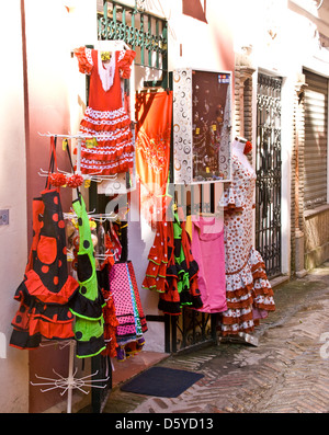 Flamenco dresses on display in a Seville street Andalusia Spain Europe Stock Photo