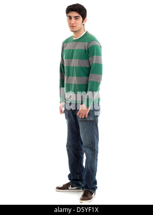 Full length portrait of young man with hands in pockets isolated on white background Stock Photo