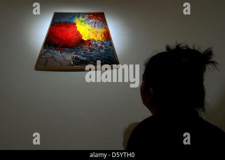 A woman views the painting 'Mari Anne di Bezzo' by artist Per Kirkeby at Ernst Barlach Museum in Wedel, Germany, 02 November 2012. The Per Kirkeby exhibition will take place from 04 NOvember 2012 til 10 February 2013. Photo: AXEL HEIMKEN Stock Photo