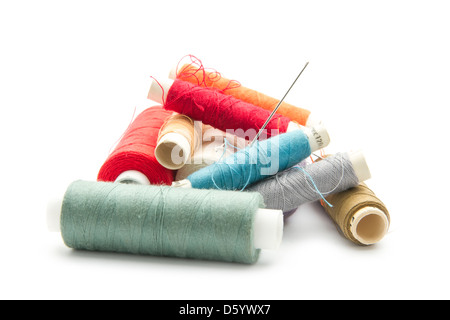 old thread spools isolated on white background Stock Photo - Alamy