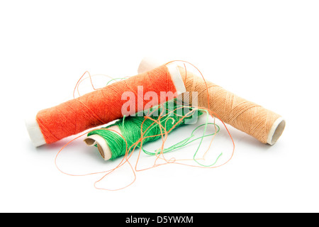 old thread spools isolated on white background Stock Photo - Alamy