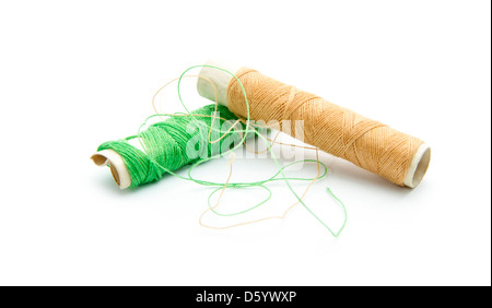 old thread spools isolated on white background Stock Photo