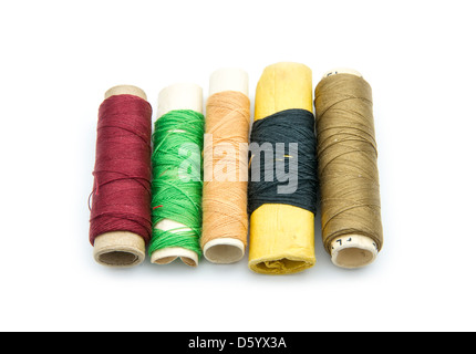 Old thread spools isolated on white background Stock Photo - Alamy