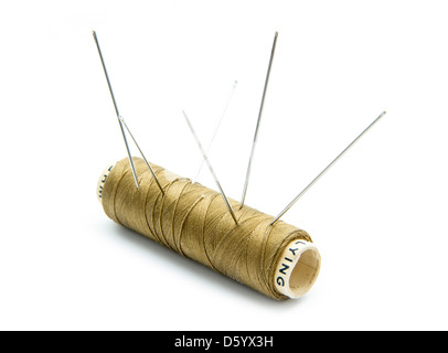 Spool of thread with needle isolated on white background. Sewing thread and  needle Stock Photo - Alamy