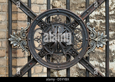 Vintage forged decorative element on metal gate in old part of Tallinn, Estonia Stock Photo