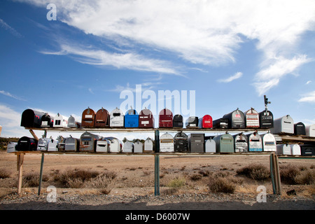 Front view of rows of mailboxes in desert Stock Photo