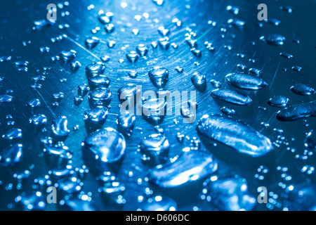 Water drops on a metal surface. Stock Photo