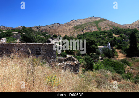 Church in the ruined deserted village of Paleo Perithia, north east Corfu Island, Greece. Stock Photo
