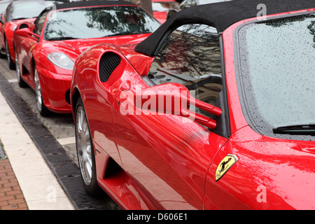 Ferrari supercars parked in the street of Estepona, Andalusia Spain Stock Photo