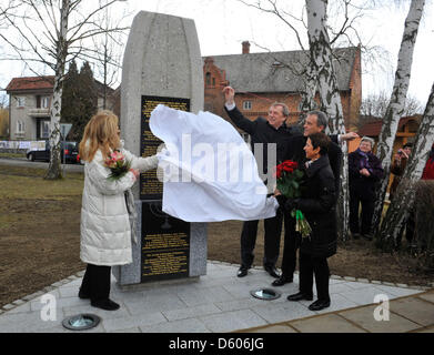 President of the U.S. Commission for the Preservation of American Heritage Abroad Foundation Joan Ellyn Silber (left) is seen during the unveiling of the monument Righteous Among the Nations and victims of holocaust in Trsice, Czech Republic, March 10, 2013. Other memorial stone was unveiled there last year. It was near to the forest shelter which was hiding a Jewish family Wolf in 1942-1945. The story of this family became famous in the world thanks Diary of Otto Wolf, equated to the Diary of Anne Frank. The daughter of Eva Wolf Felicite Vavreckova is seen on the right. (CTK Photo/Ludek Perin Stock Photo