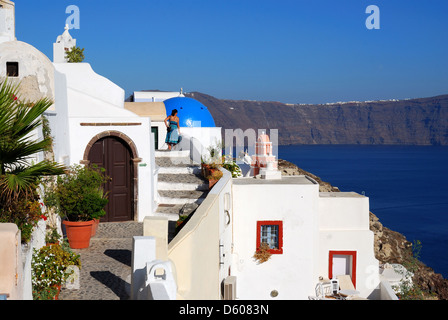 Oia is a community on the islands of Thira (Santorini) and Therasia, in the Cyclades, Greece. Aegean Sea. Stock Photo
