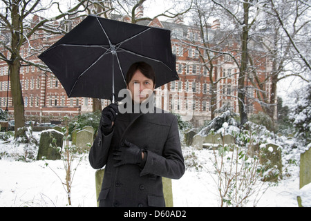 Brett Anderson of Suede photographed  in St Johns Wood church gardens, London, England. Stock Photo