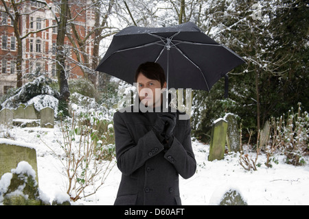 Brett Anderson of Suede photographed  in St Johns Wood church gardens, London, England. Stock Photo