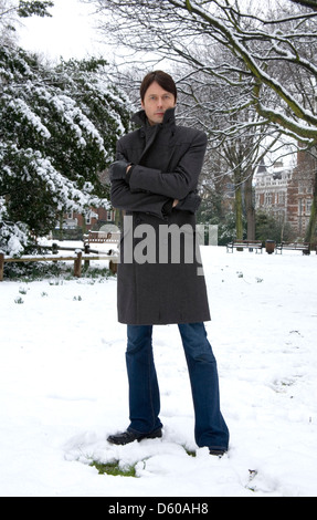 Brett Anderson of Suede photographed  in St Johns Wood church gardens, London, England. Stock Photo